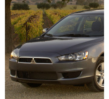 Бампер передний в цвет кузова Mitsubishi Lancer Х  (2007-2010)